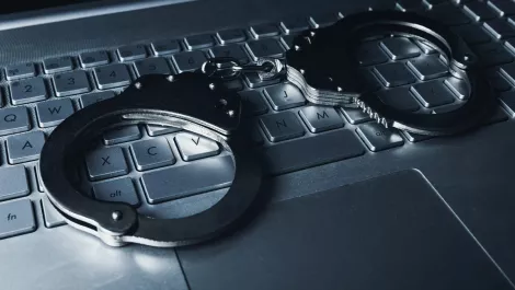 AFP arrests two men with ties to Australian SMS phishing scheme